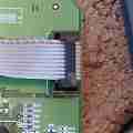 Female IDC connector plugged into the main Linksys PCB